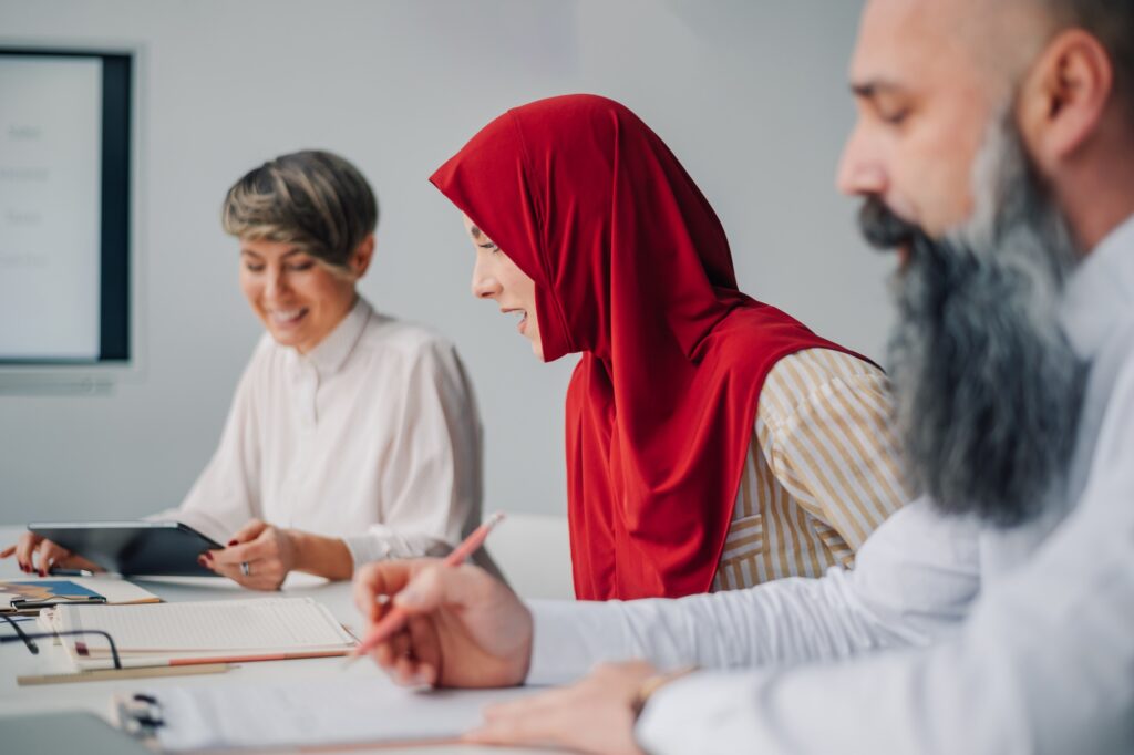 Business people collaborating during meeting in modern office